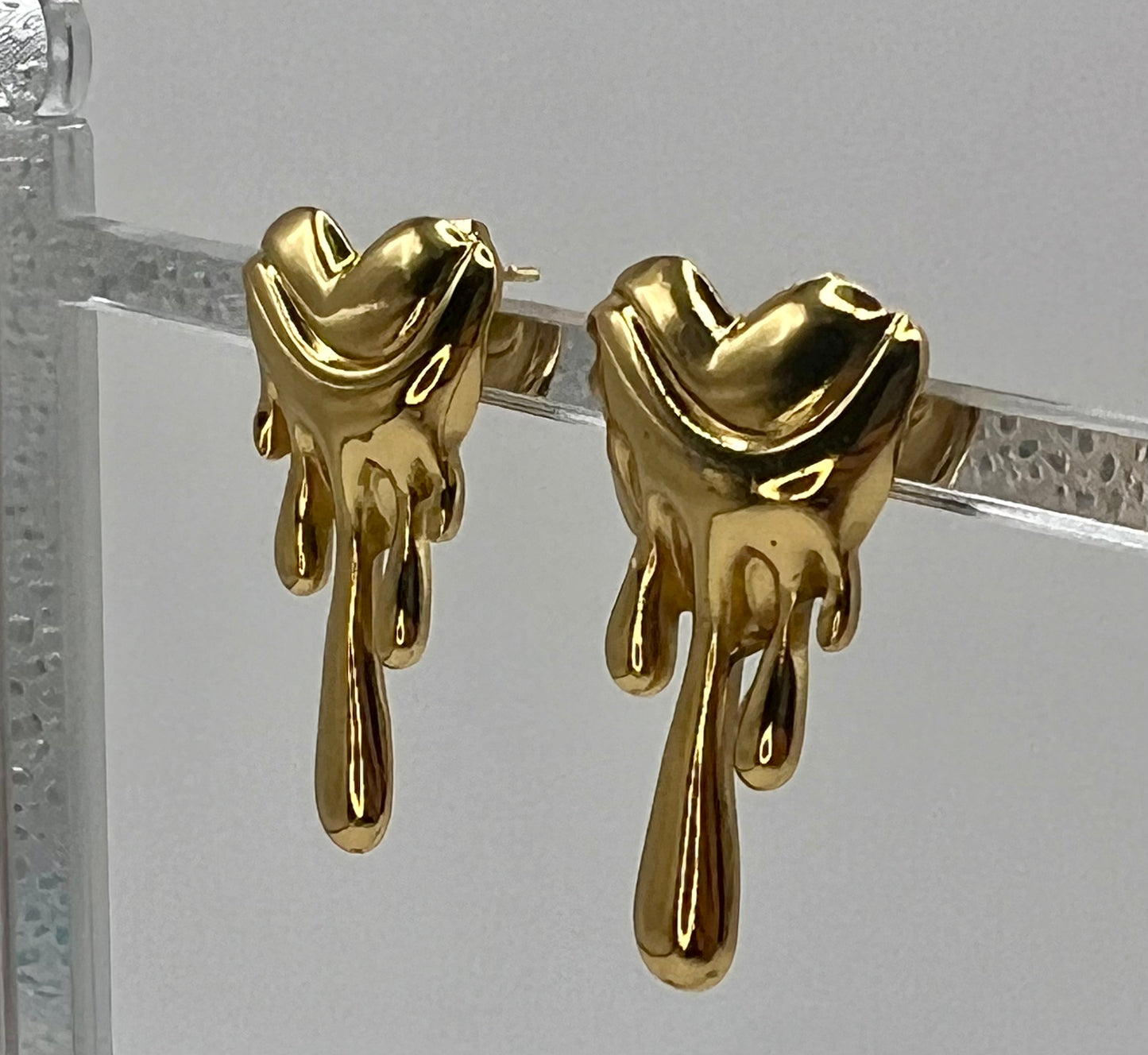 Melted heart earring