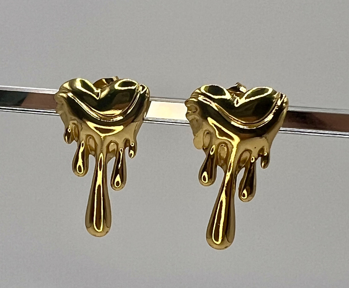 Melted heart earring