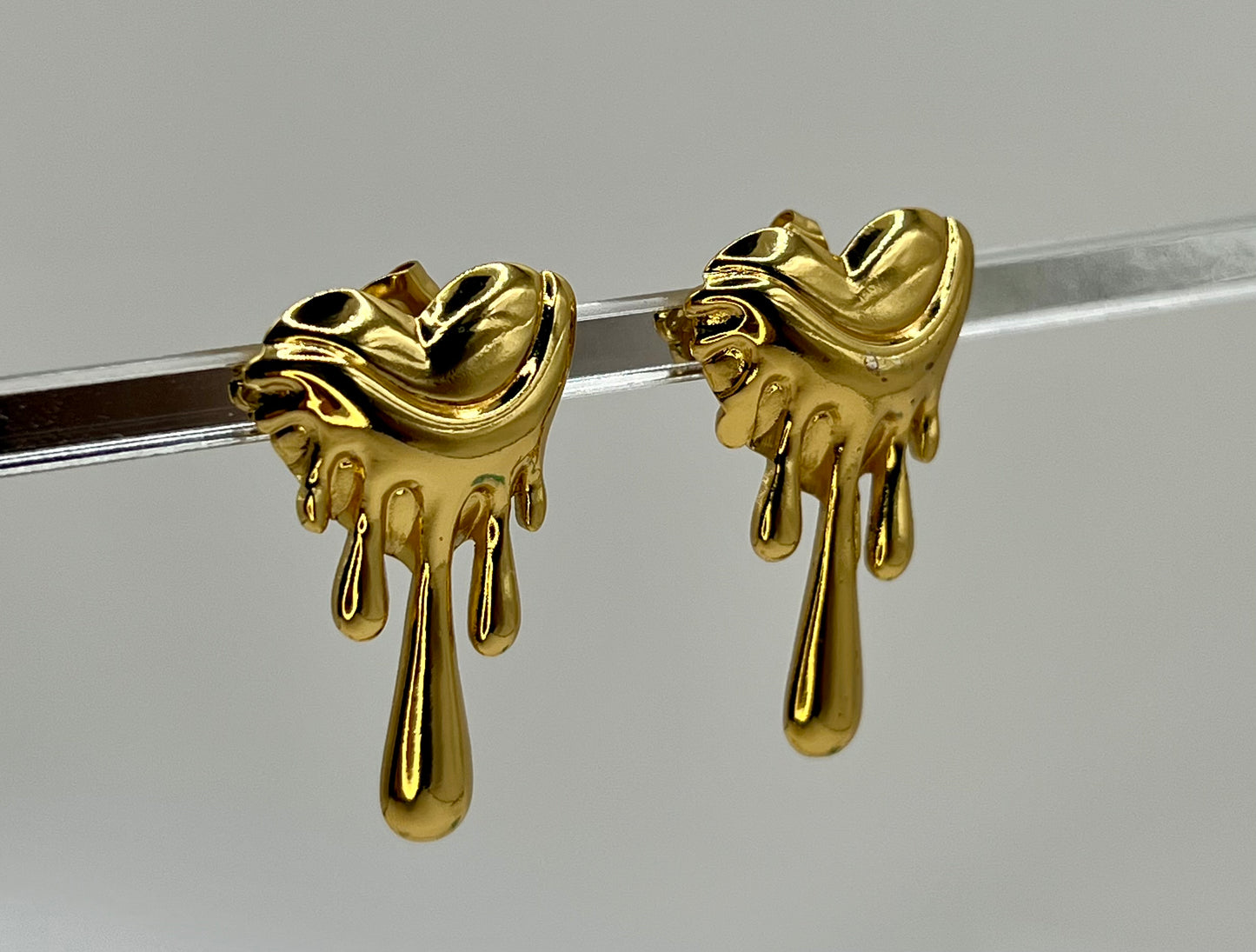 Melted heart earring