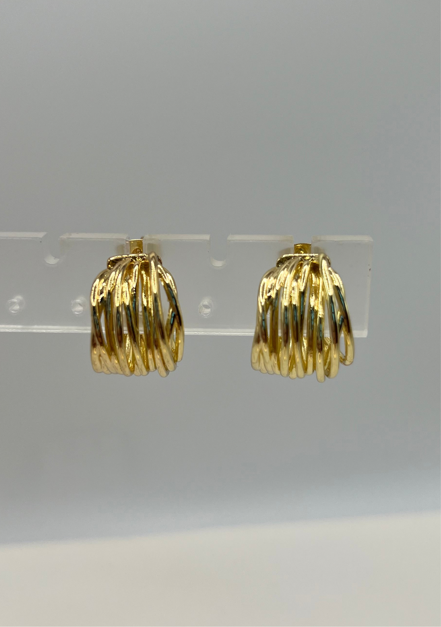 C shaped golden earrings