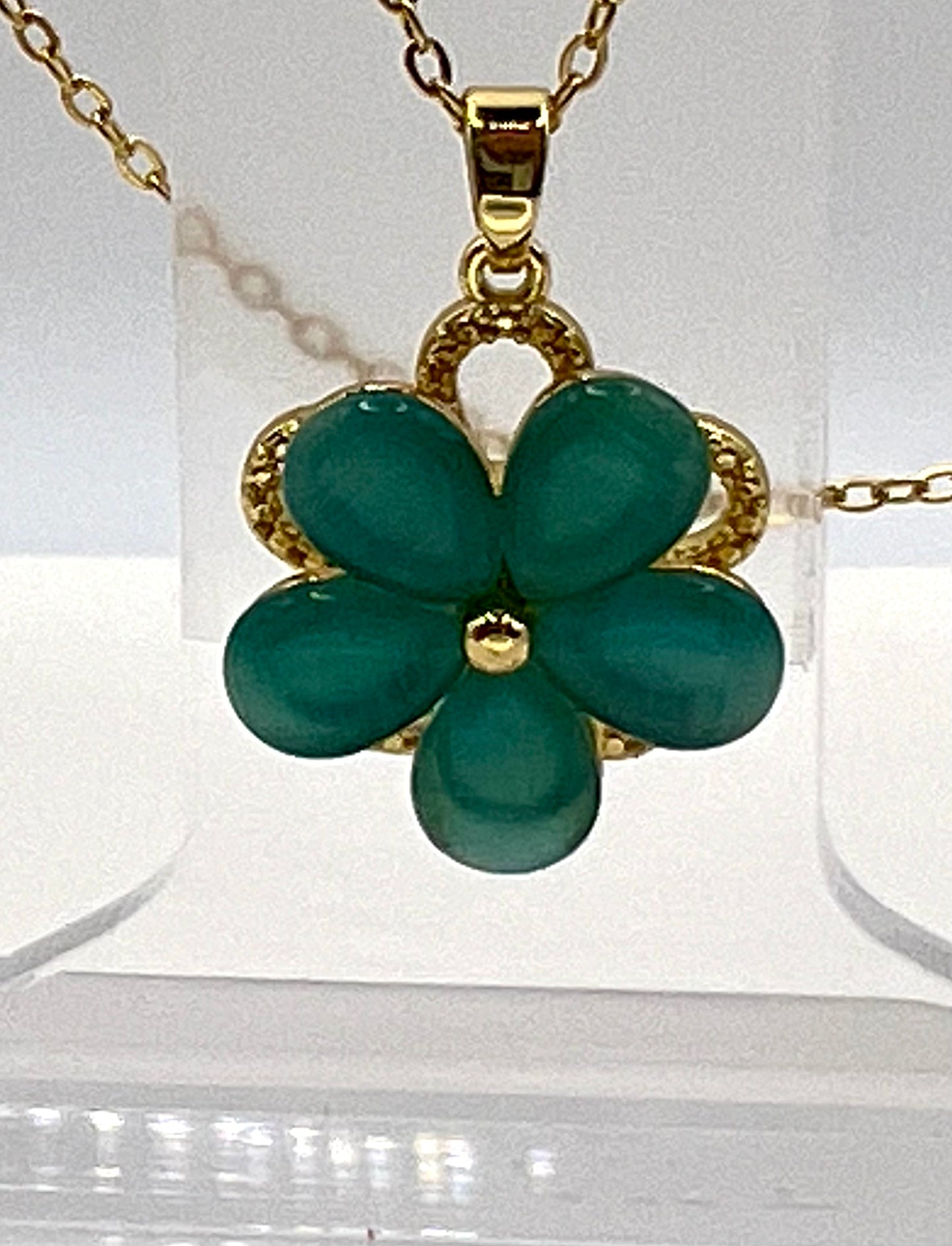 Beautiful teal flower rotating necklace